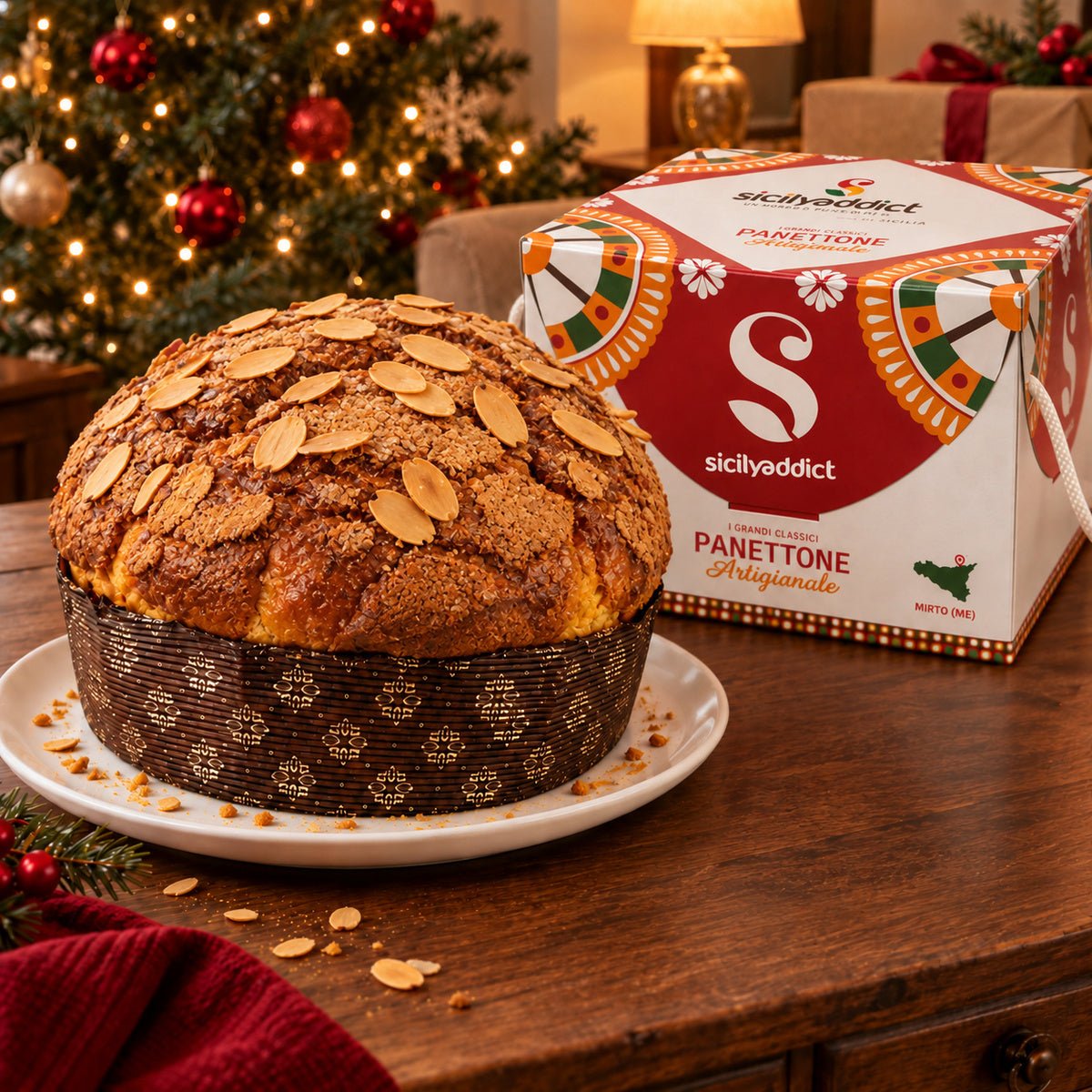 Panettone Pandorato accanto alla confezione regalo.
